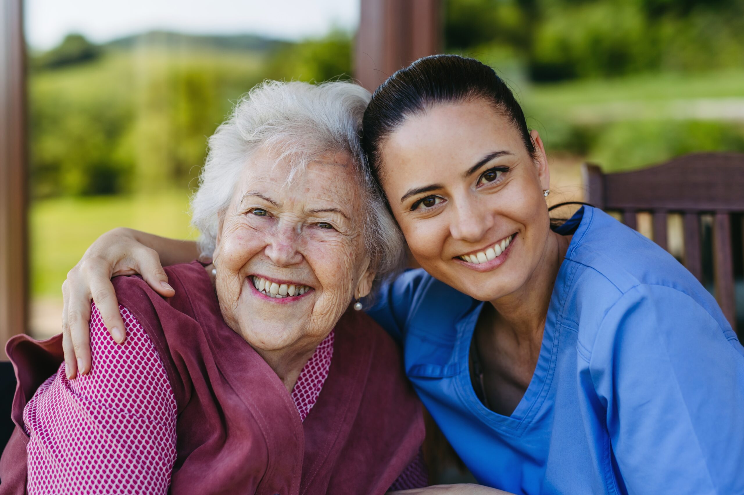 Portrait of female caregiver and senior woman